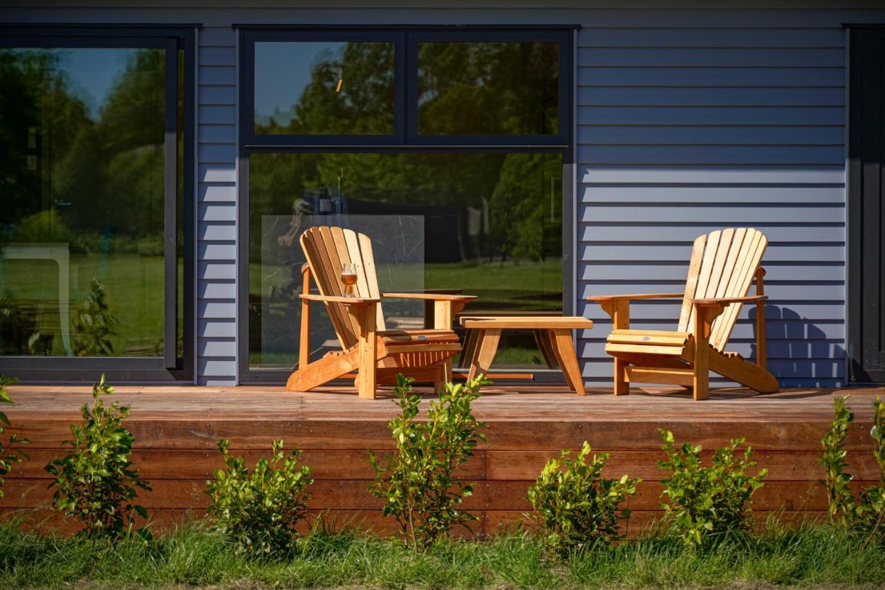 Parehua Resort Мартинборо Экстерьер фото A deck with A-frame chairs